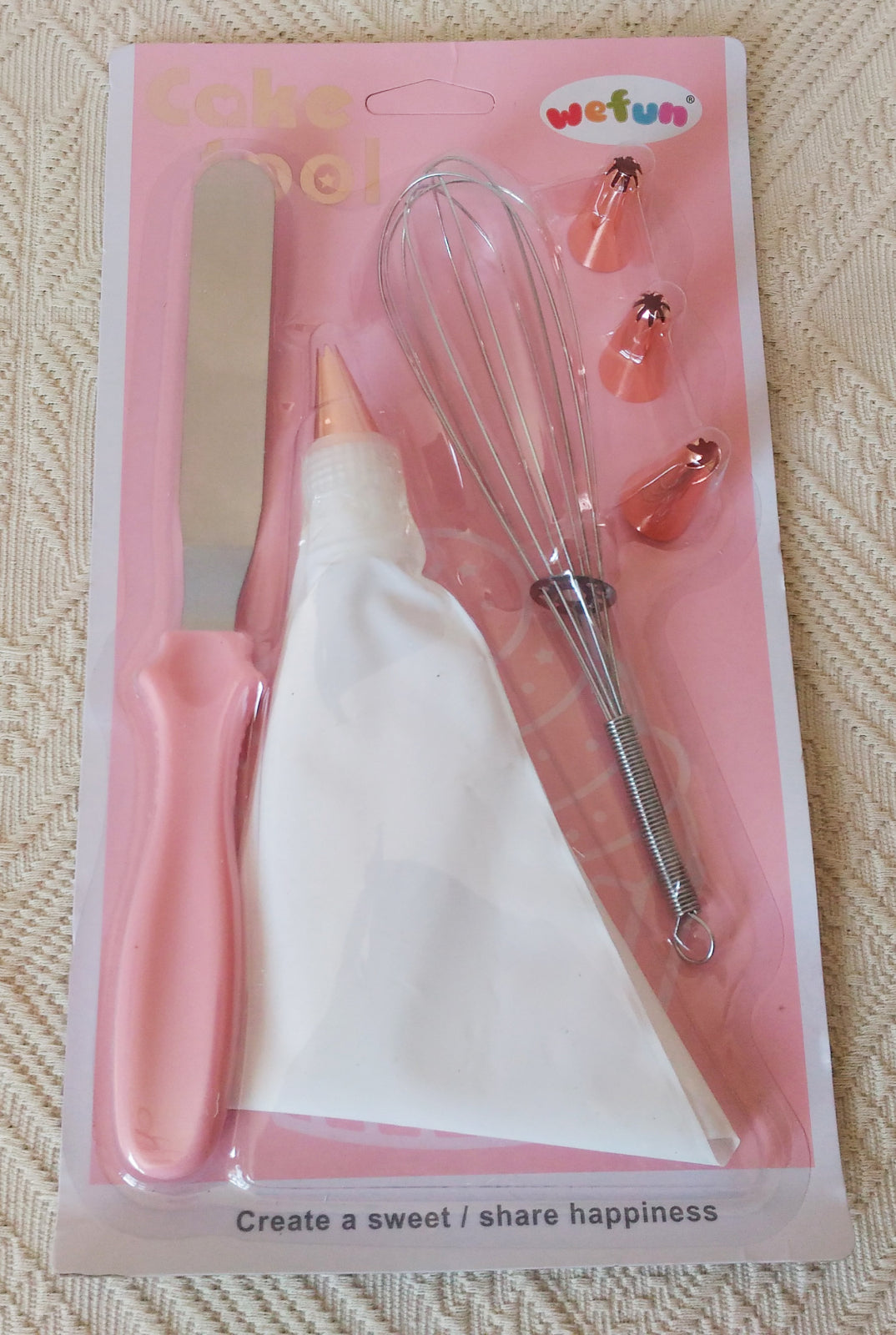 Set punga ornat cu 4 capete, un tel si o spatula, Plastic + Metal