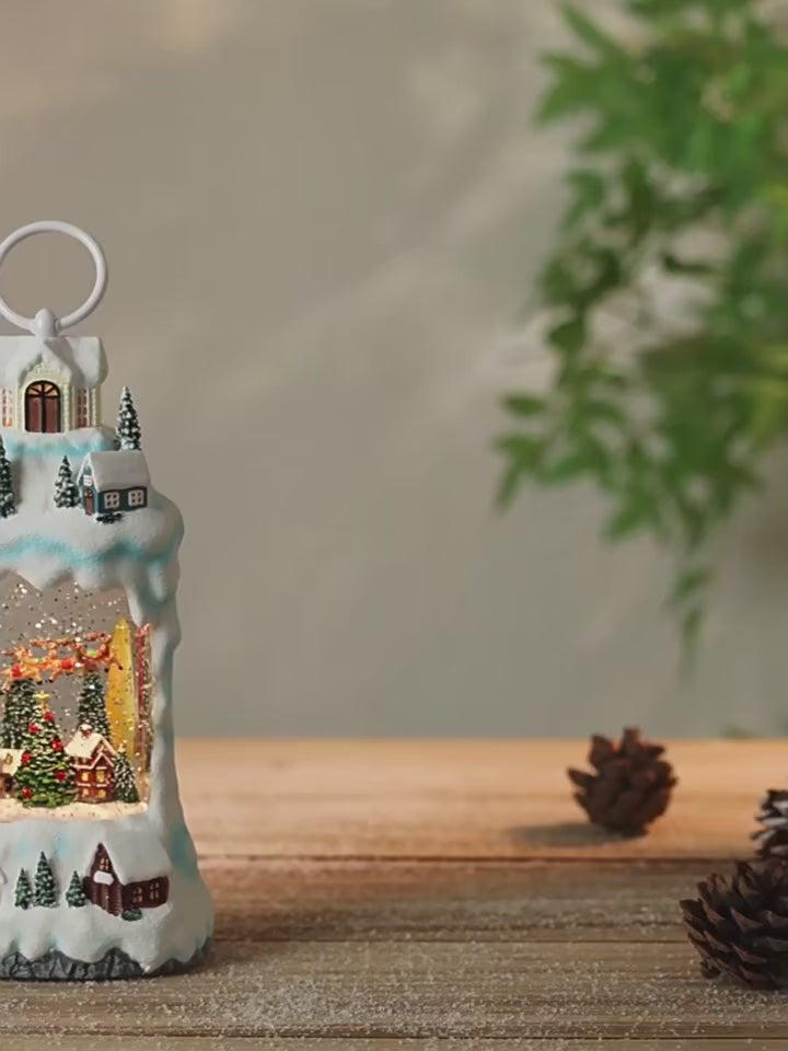 Decoratiune Muzicala - Casa de Anul Nou cu om de zapada, cu apa si scilipic miscator , 28x15 x10 cm